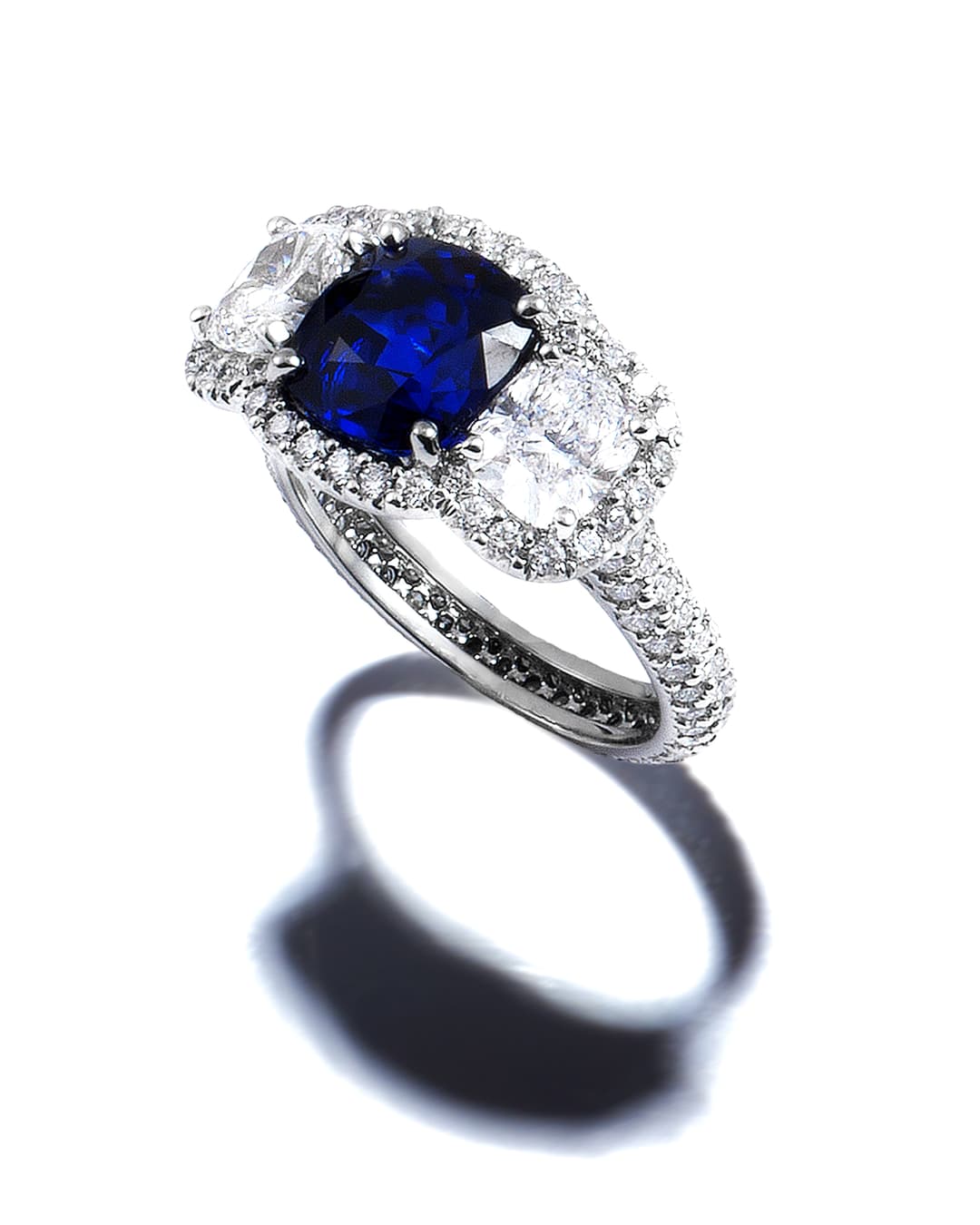 Platinum Sapphire 3-Stone Halo Ring