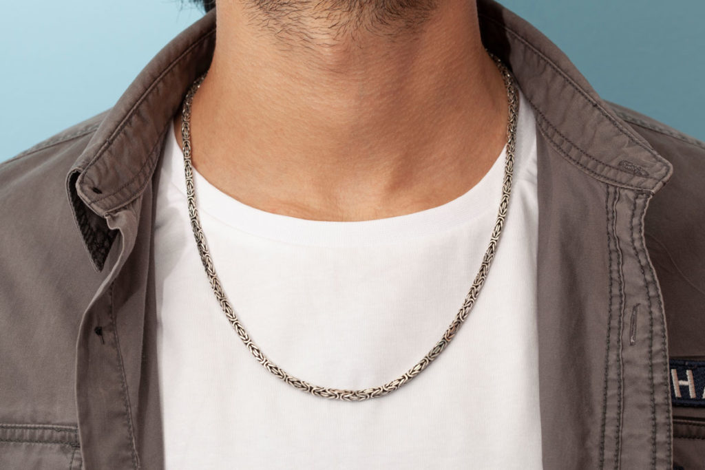 Chain metal necklace. Different kinds of necklaces for men